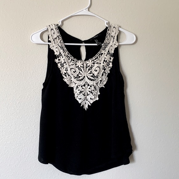 Black shirt with details in front. Size S from forever 21 - Picture 1 of 1